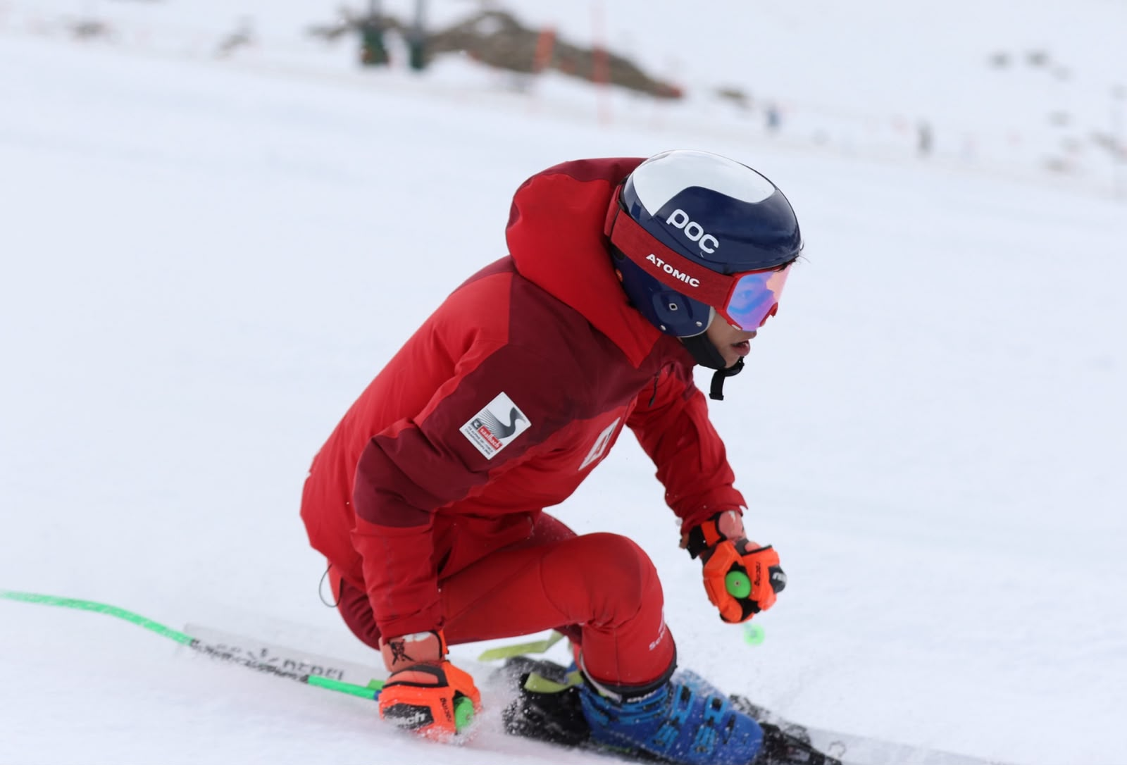 Ski racer in red during training